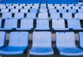 Empty blue seats or chair rows in stadium Royalty Free Stock Photo