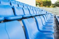 Empty blue seats or chair rows in stadium Royalty Free Stock Photo