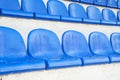 Empty blue seats of sport stadium. Sports events, competitions, championships, without spectators during quarantine Royalty Free Stock Photo