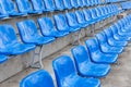 Empty blue seats in stadium Royalty Free Stock Photo