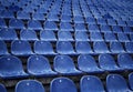 Empty blue stadium seats in a line Royalty Free Stock Photo