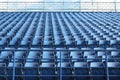 Empty blue stadium seats pattern with clean and orderly. Royalty Free Stock Photo