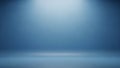 Empty Blue Studio Background with Soft Spotlight and Subtle Floor Reflection for Product Display Keywords: studio Royalty Free Stock Photo