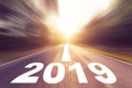 Empty blur asphalt road and New year 2019 concept. Driving on an Royalty Free Stock Photo