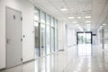 Empty blurred white corridor in modern office building Royalty Free Stock Photo