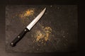 Empty board with bread crumbs and knife. Food and cutlery. The concept of hunger. no food. food crisis Royalty Free Stock Photo