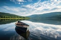 an empty boat drifting near a scenic lake shore