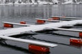 Empty boat moorings on lake