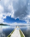 Empty boat port on calm water surface lake in Ohrid Royalty Free Stock Photo