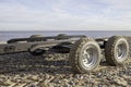 Empty boat trailer on the beach Royalty Free Stock Photo