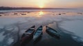 Empty boats on iced lake. On drone view.