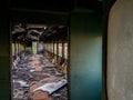 Empty bogey of the retired train with rusty debris and garbage inside Royalty Free Stock Photo