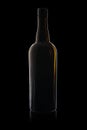 Empty bottle from dark glass isolated on a black background with reflection Royalty Free Stock Photo