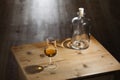 Empty bottle and glass of brandy Royalty Free Stock Photo