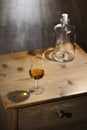 Empty bottle and glass of brandy Royalty Free Stock Photo