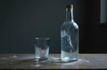 Empty bottle of vodka and glass in dirty grim room. Alcoholism problem, social and health issues connected with alcohol Royalty Free Stock Photo