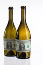 Empty bottles of wine from the label of dollar bill Royalty Free Stock Photo