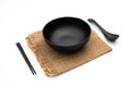 Empty bowl chopsticks spoon on sack white Royalty Free Stock Photo