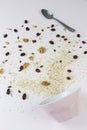 Empty bowl with healthy cereal spilled on the table Royalty Free Stock Photo