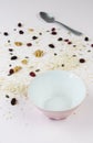 Empty bowl with healthy cereal spilled on the table Royalty Free Stock Photo