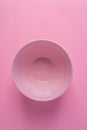 Empty Bowl on Pink Background. Identical Monochrome Pastel Colors. Minimalist Creative Geometrical Image Poster Banner