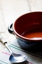 Empty bowl and spoon on the table Royalty Free Stock Photo