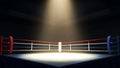 Empty boxing ring under spotlight in dark arena, dramatic lighting for match Royalty Free Stock Photo