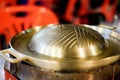 Empty brass pot pan for cooking barbecue grill Royalty Free Stock Photo