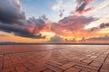 Empty brick floor and sunset clouds Royalty Free Stock Photo