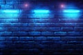 Empty brick wall bathed in vibrant blue light from neon lamps, creating a striking backdrop Royalty Free Stock Photo