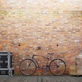 Empty brick wall for mockup with a bike and decor on a urban exterior. Royalty Free Stock Photo