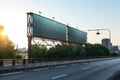 An empty bridge on a hot summer day with only the wind and traffic lights for accompaniment. Blank empty billboard mock