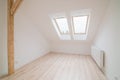 Empty bright attic room.