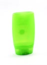 Empty bright green plastic travel size shampoo bottle Royalty Free Stock Photo