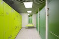 Empty bright modern cloakroom and Shower cabins in Royalty Free Stock Photo
