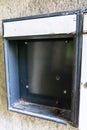 Empty broken mailbox from run down building Royalty Free Stock Photo
