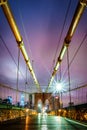 Empty Brooklyn Bridge pedestrian walkway before sunrise Royalty Free Stock Photo