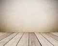 Empty brown cement wall and vintage wooden floor room in perspective view, grunge background, interior design, product display Royalty Free Stock Photo