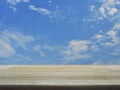 Empty brown wooden table top over blue sky Royalty Free Stock Photo