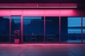 an empty building with pink lights and a potted plant