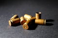 Empty bullet shell casings, on a black background, smoke Royalty Free Stock Photo