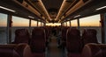 Empty Bus Interior with Scenic Sunset View Through Windows Royalty Free Stock Photo