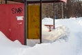 Empty bus stop covered with snow in winter Royalty Free Stock Photo