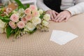 Empty business cards on the table with roses Royalty Free Stock Photo