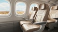 Empty business class passenger seats in the cabin of a commercial aircraft, plane interior Royalty Free Stock Photo