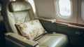Empty business class passenger seats in the interior of a commercial aircraft cabin Royalty Free Stock Photo