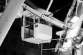 Empty cabin of funfair ferris wheel on black background at night Royalty Free Stock Photo