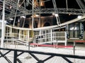 Empty cabins on the illuminated ferris wheel in amusement park at night Royalty Free Stock Photo