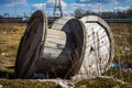 An empty cable reel is left on site. The problem of ecology. Royalty Free Stock Photo