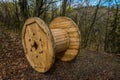 An empty cable reel is left on site. The problem of ecology Royalty Free Stock Photo